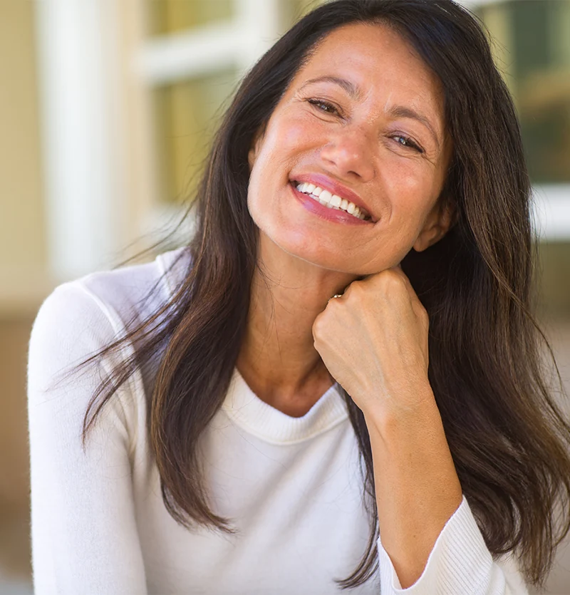 Portrait of beautiful mature woman with brunette hair